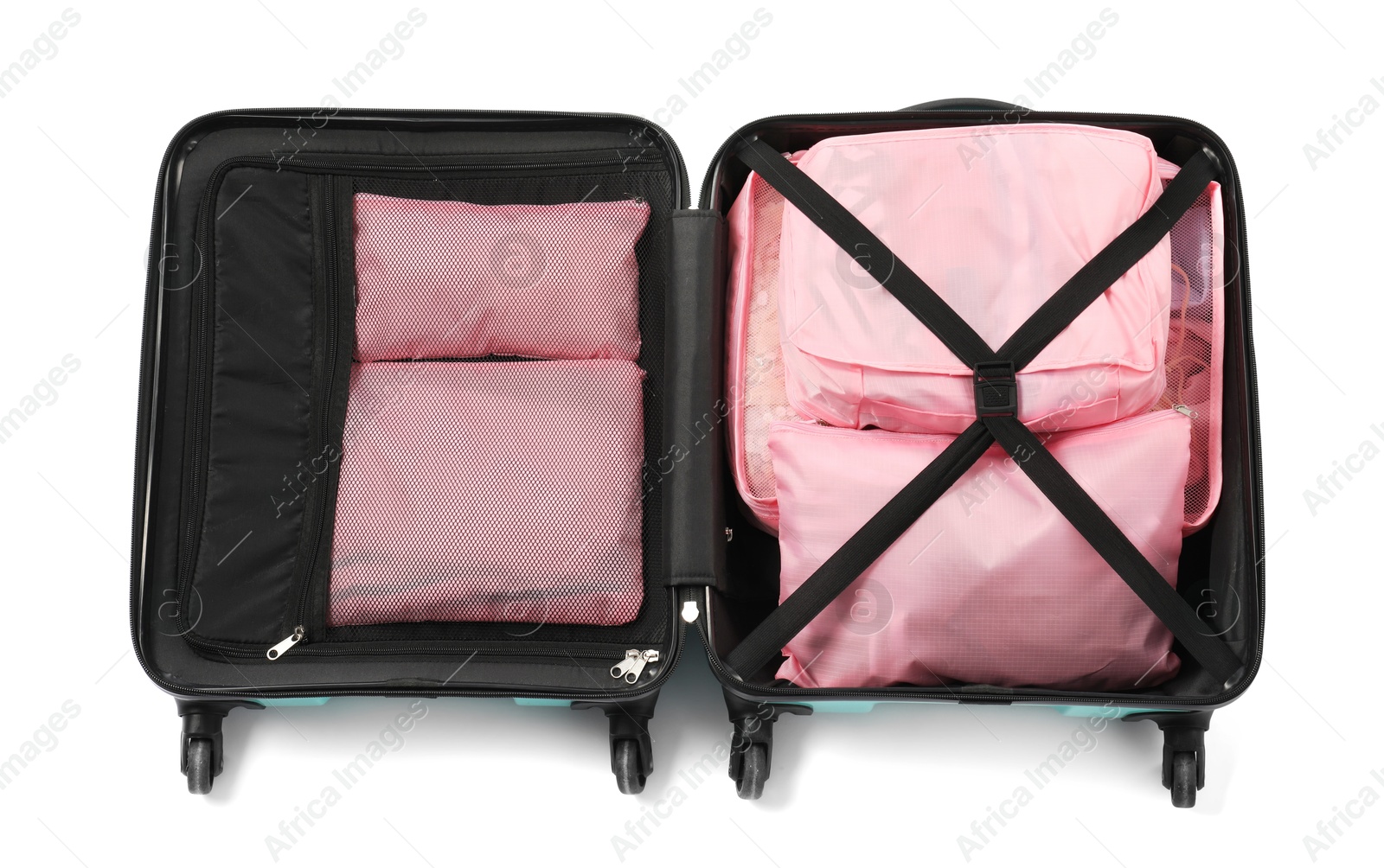 Open suitcase with packing cubes isolated on white, top view Photo of Open suitcase with packing cubes isolated on white, top view