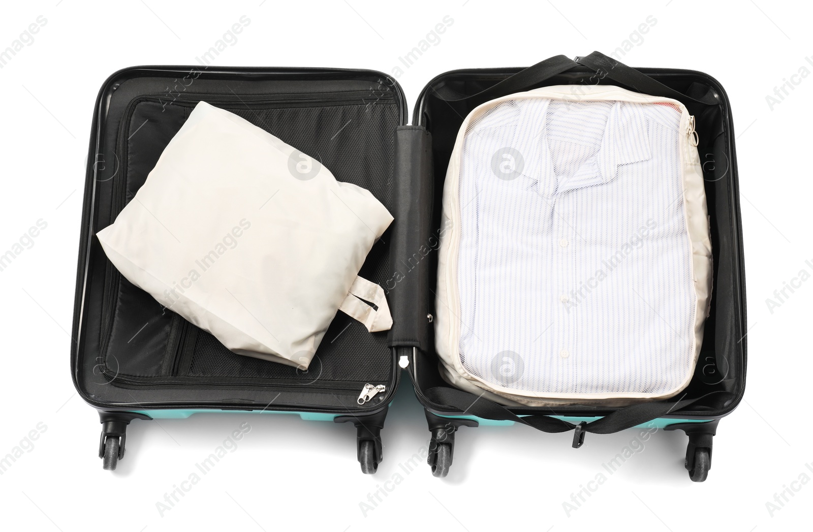 Open suitcase with packing cubes isolated on white, top view Photo of Open suitcase with packing cubes isolated on white, top view