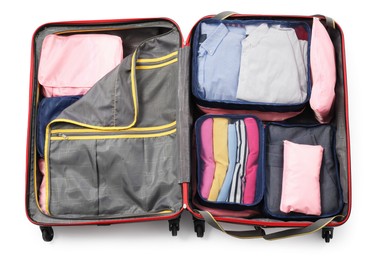Photo of Open suitcase with packing cubes isolated on white, top view