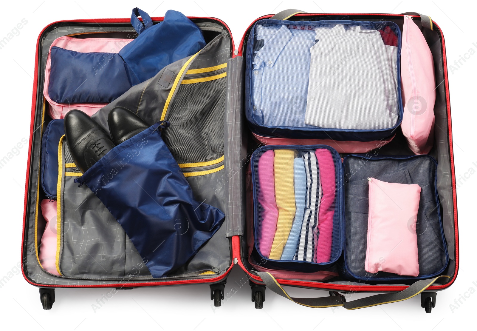 Open suitcase with packing cubes isolated on white, top view Photo of Open suitcase with packing cubes isolated on white, top view