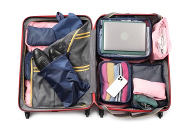 Photo of Open suitcase with packing cubes isolated on white, top view