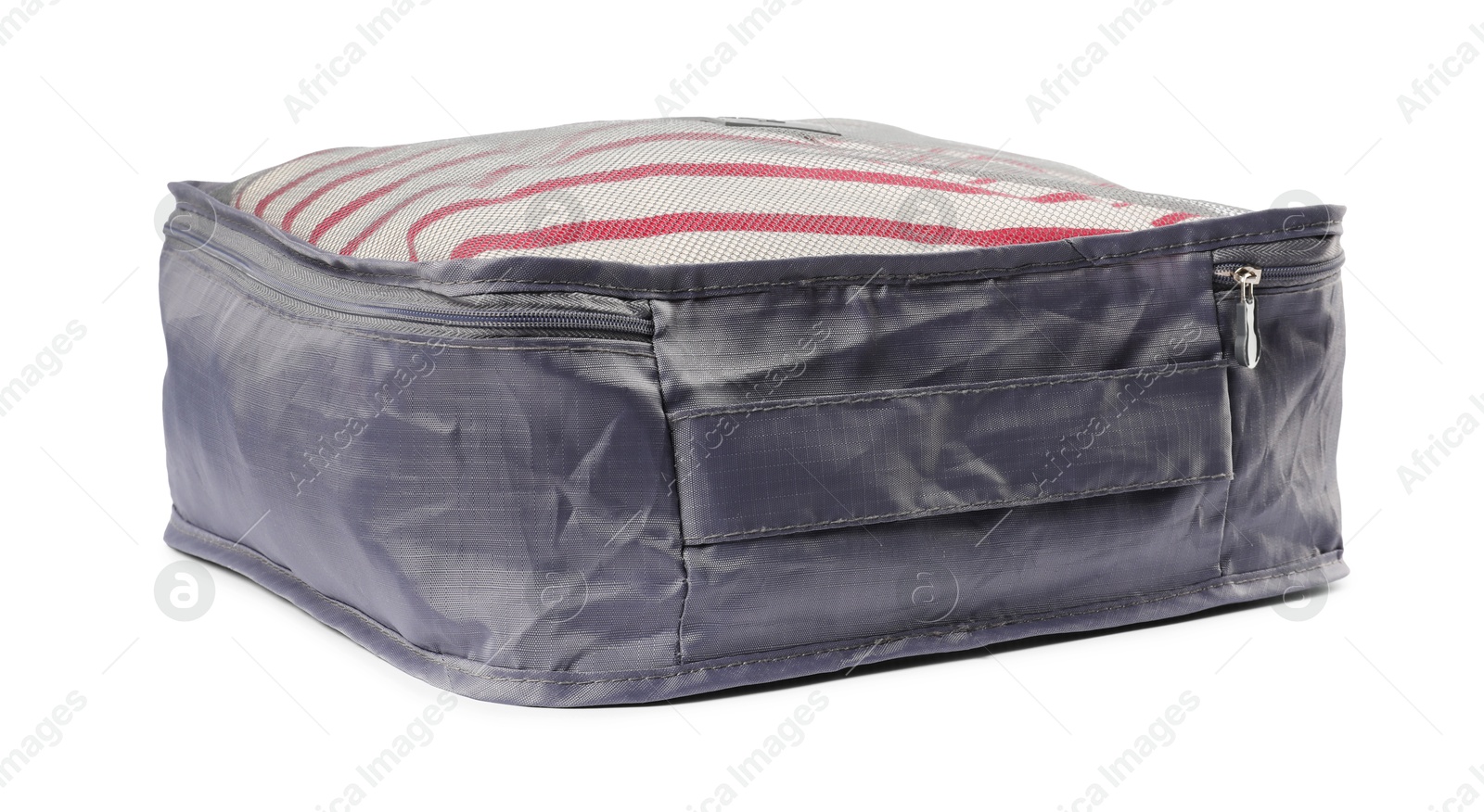 Packing cube with folded clothes isolated on white Photo of Packing cube with folded clothes isolated on white