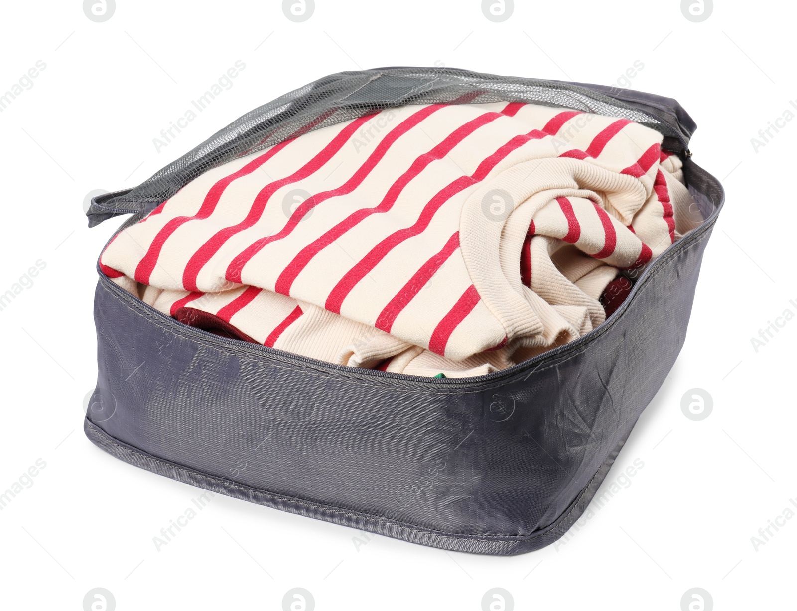 Packing cube with folded clothes isolated on white Photo of Packing cube with folded clothes isolated on white