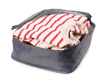 Photo of Packing cube with folded clothes isolated on white