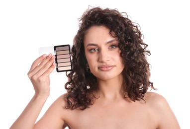 Photo of Woman with eyeshadow palette on white background