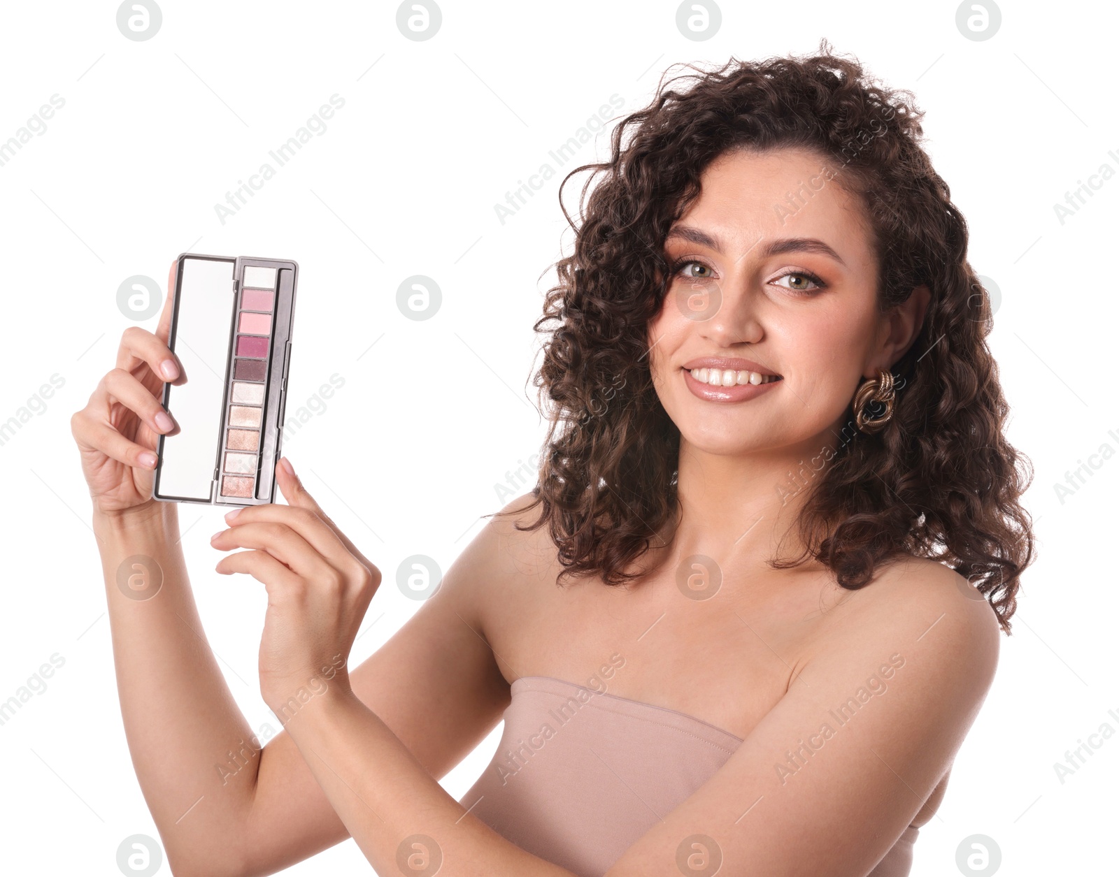 Smiling woman with eyeshadow palette on white background Photo of Smiling woman with eyeshadow palette on white background