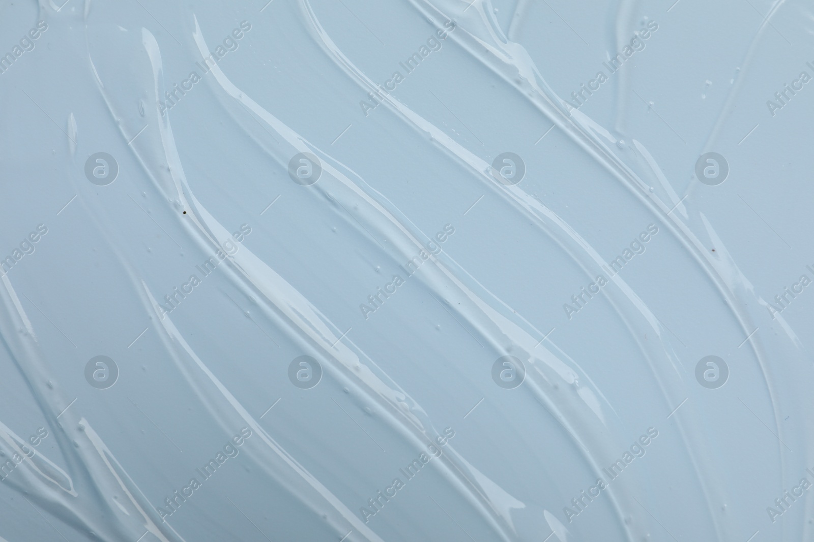 Collagen gel on light blue background, top view Photo of Collagen gel on light blue background, top view