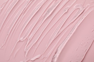 Photo of Collagen gel on pink background, closeup view