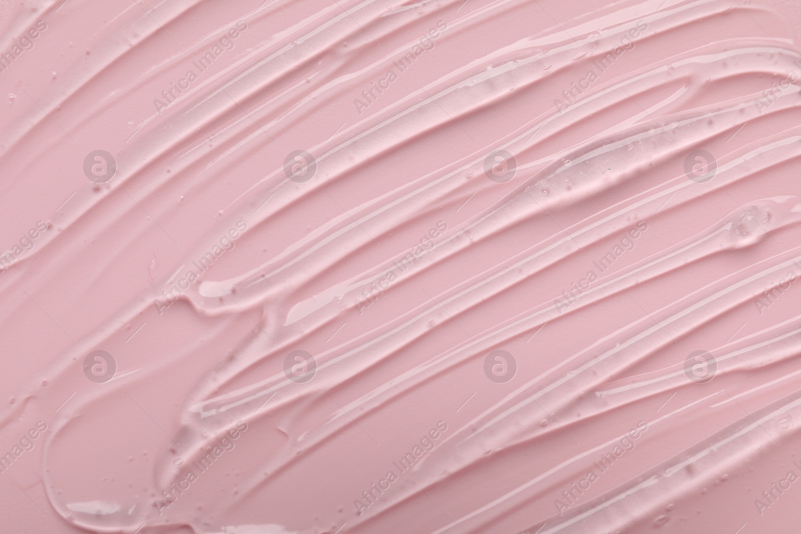 Collagen gel on pink background, top view Photo of Collagen gel on pink background, top view