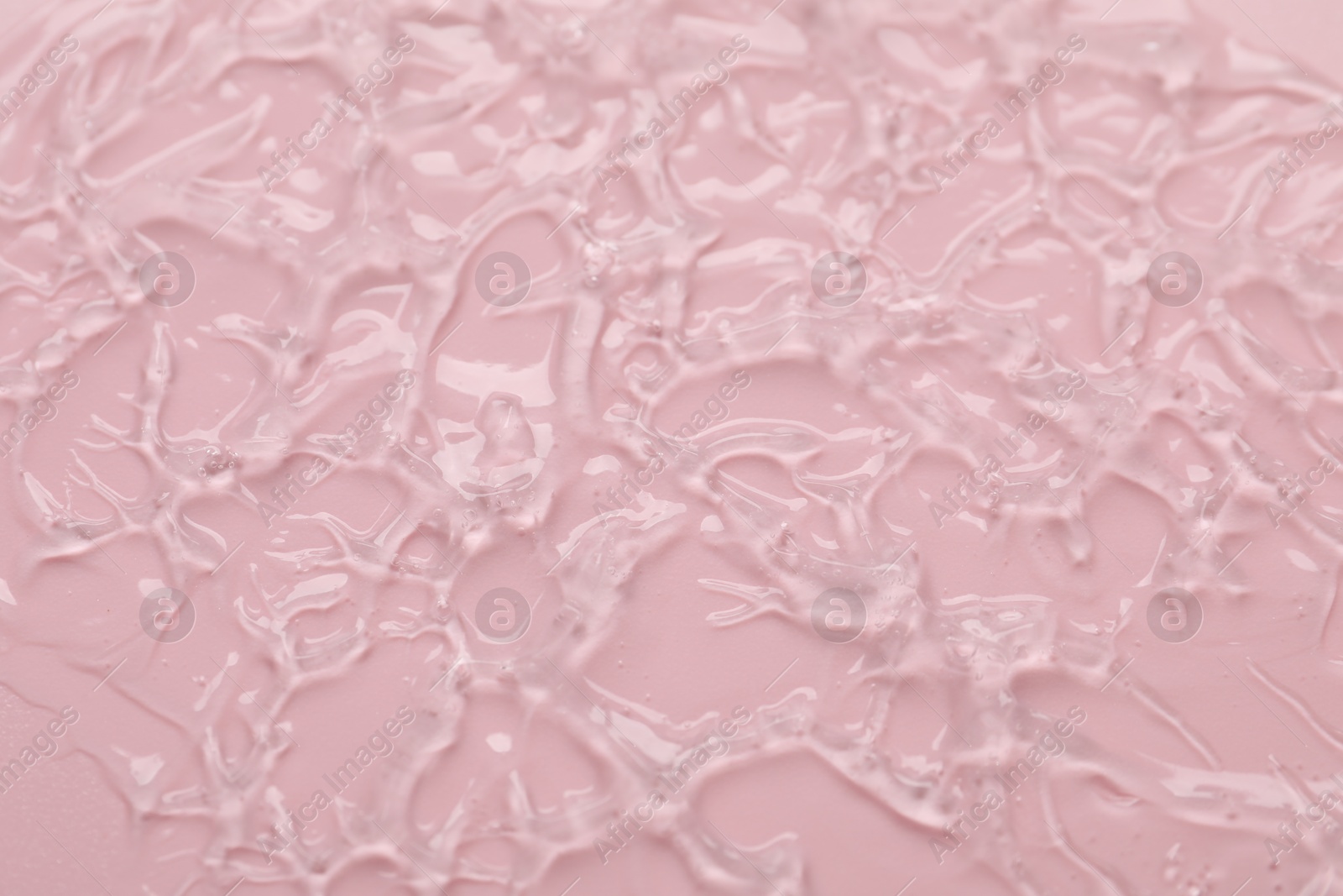 Collagen gel on pink background, above view Photo of Collagen gel on pink background, above view