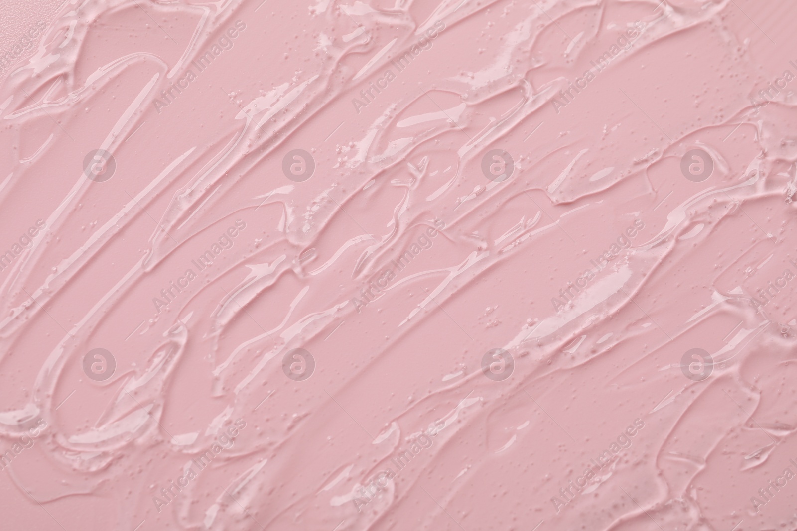 Collagen gel on pink background, top view Photo of Collagen gel on pink background, top view