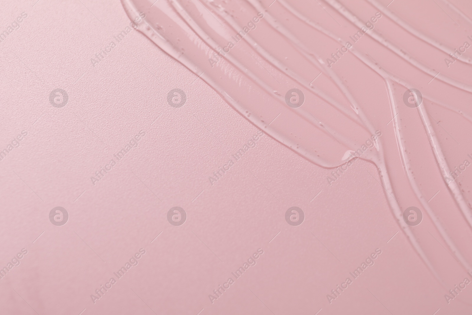 Collagen gel on pink background, top view. Space for text Photo of Collagen gel on pink background, top view. Space for text