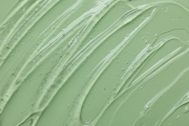 Photo of Collagen gel on green background, above view