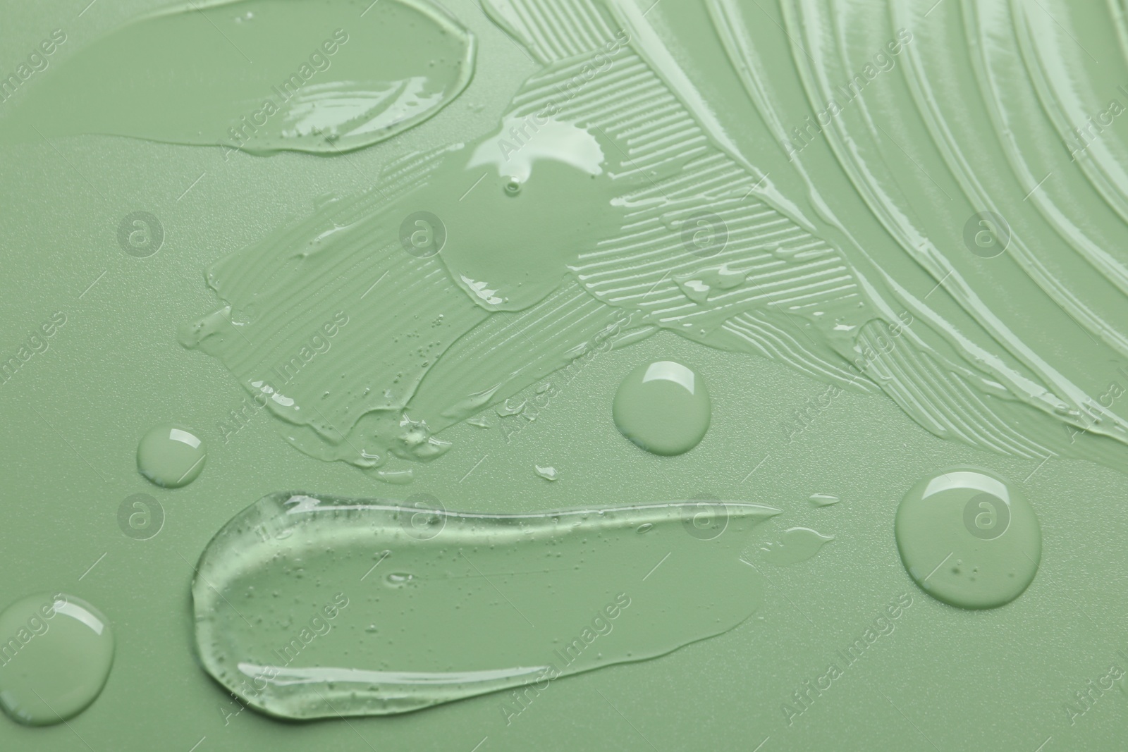 Collagen gel on green background, top view Photo of Collagen gel on green background, top view