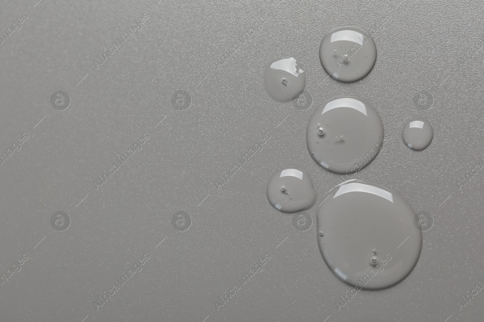 Collagen gel on grey background, top view. Space for text Photo of Collagen gel on grey background, top view. Space for text