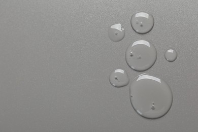 Photo of Collagen gel on grey background, top view. Space for text
