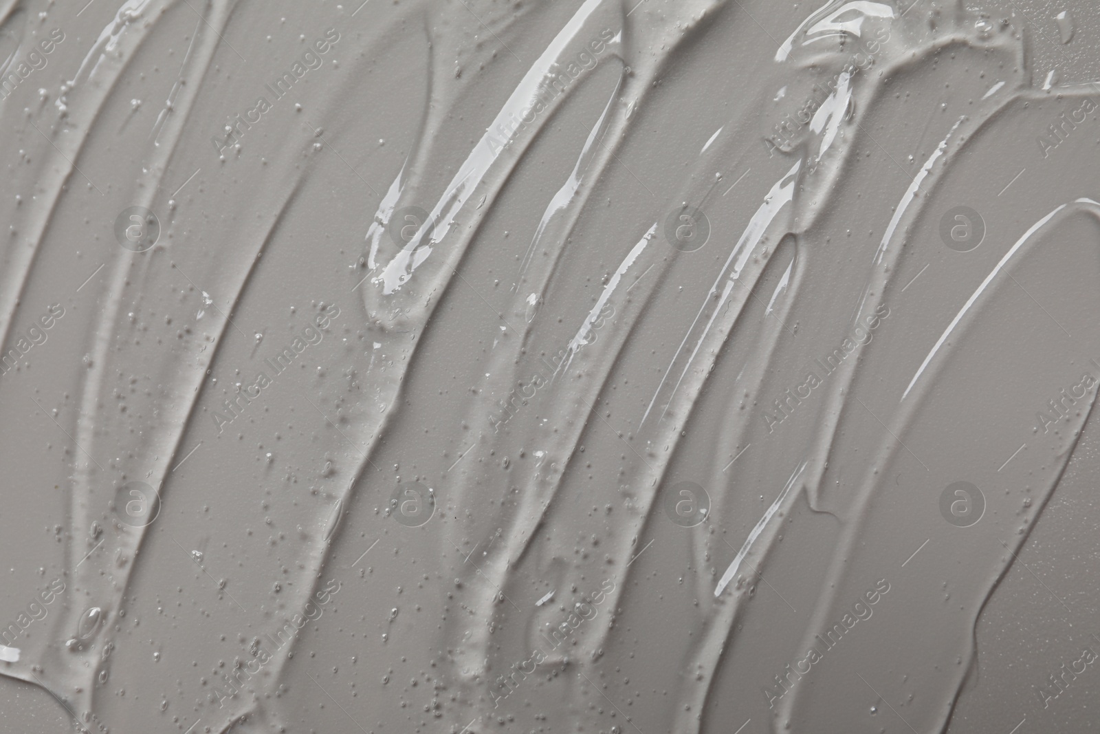 Collagen gel on grey background, top view Photo of Collagen gel on grey background, top view