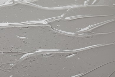 Photo of Collagen gel on grey background, above view