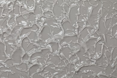 Photo of Collagen gel on grey background, top view