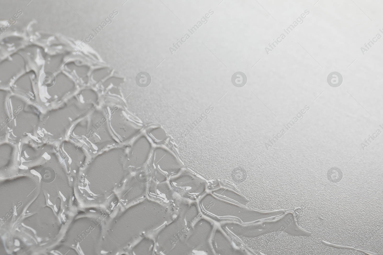 Collagen gel on grey background, closeup. Space for text Photo of Collagen gel on grey background, closeup. Space for text