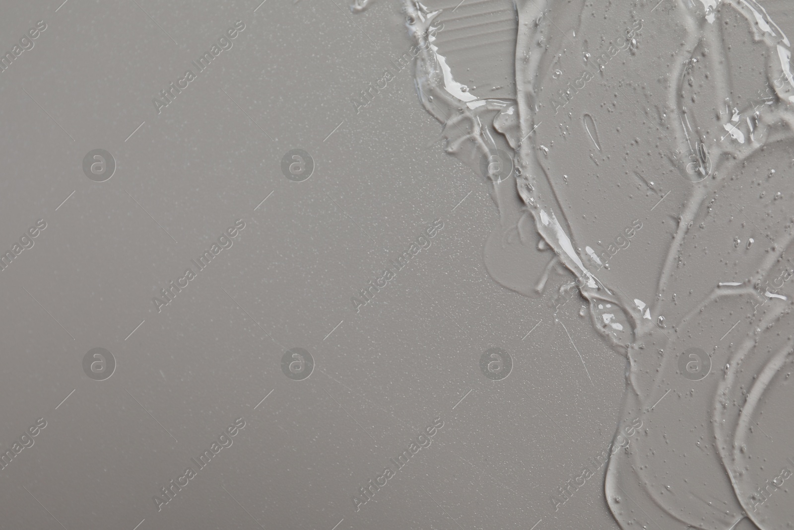 Collagen gel on grey background, top view. Space for text Photo of Collagen gel on grey background, top view. Space for text