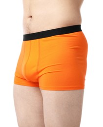 Photo of Young man in stylish orange underwear on white background, closeup