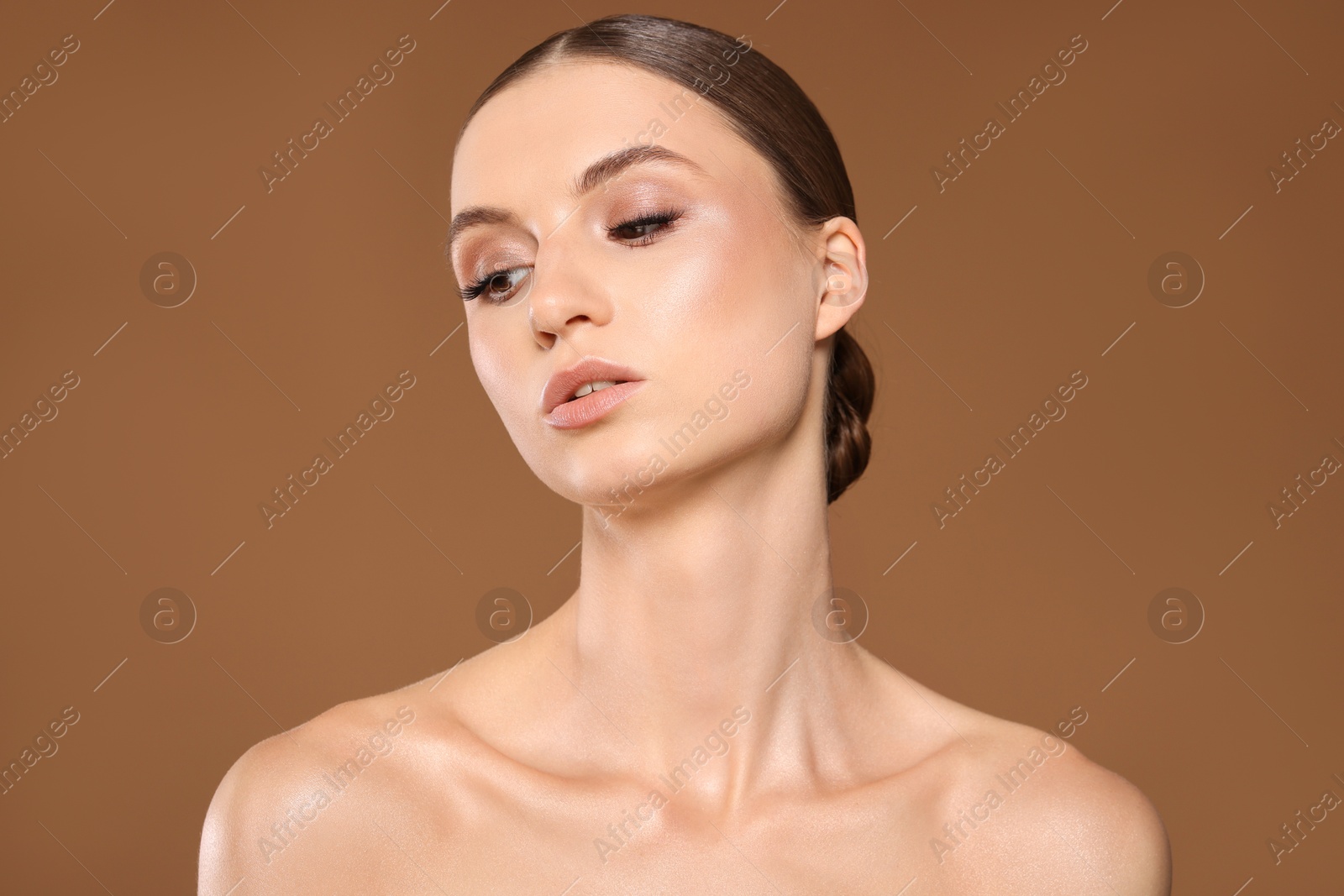Portrait of beautiful young woman on beige background Photo of Portrait of beautiful young woman on beige background
