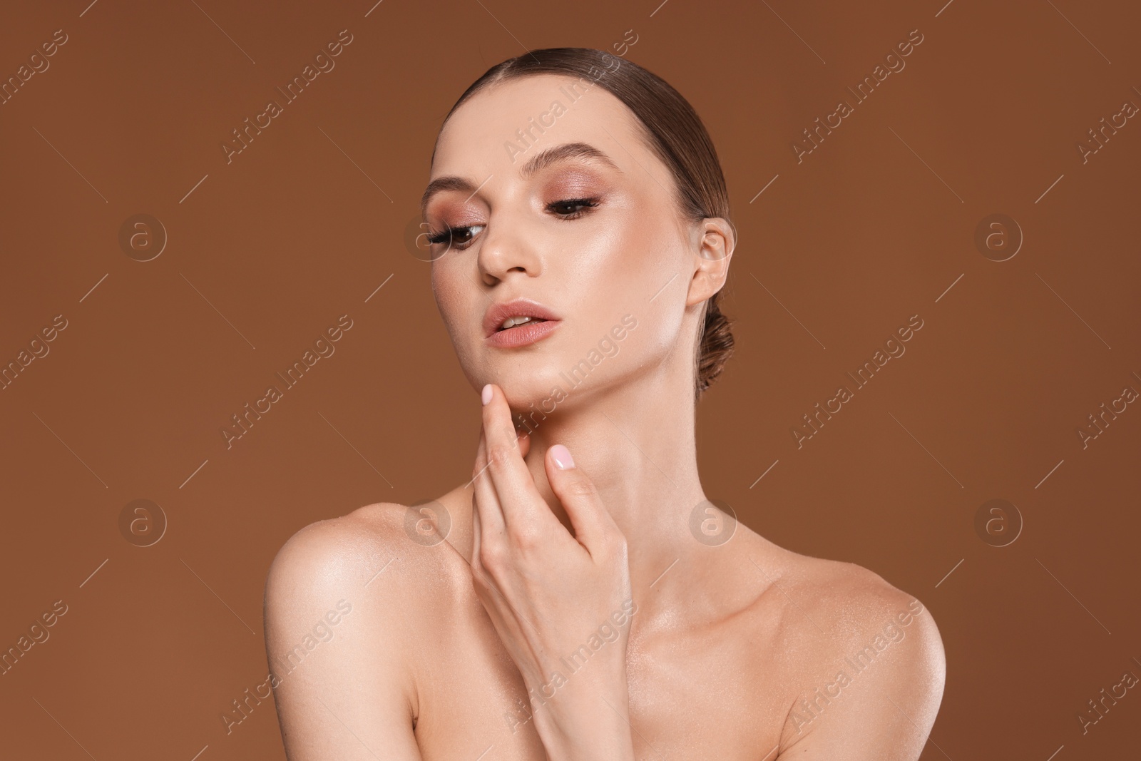 Portrait of beautiful young woman on beige background Photo of Portrait of beautiful young woman on beige background