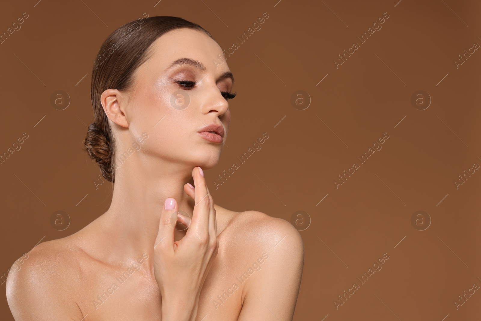 Portrait of beautiful young woman on beige background, space for text Photo of Portrait of beautiful young woman on beige background, space for text