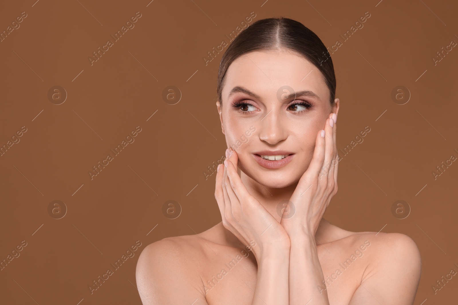 Portrait of beautiful young woman on beige background, space for text Photo of Portrait of beautiful young woman on beige background, space for text