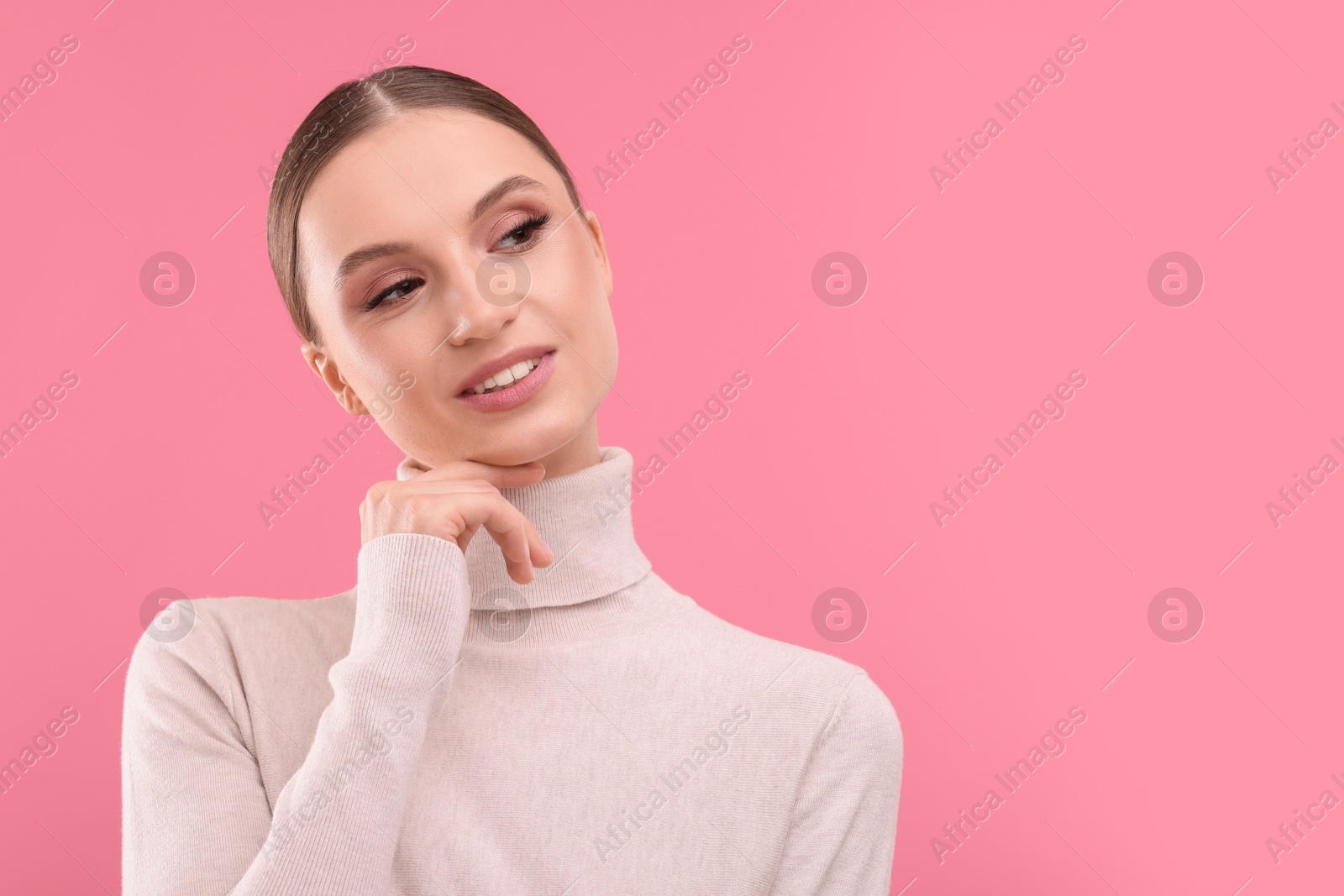 Portrait of beautiful young woman on pink background, space for text Photo of Portrait of beautiful young woman on pink background, space for text