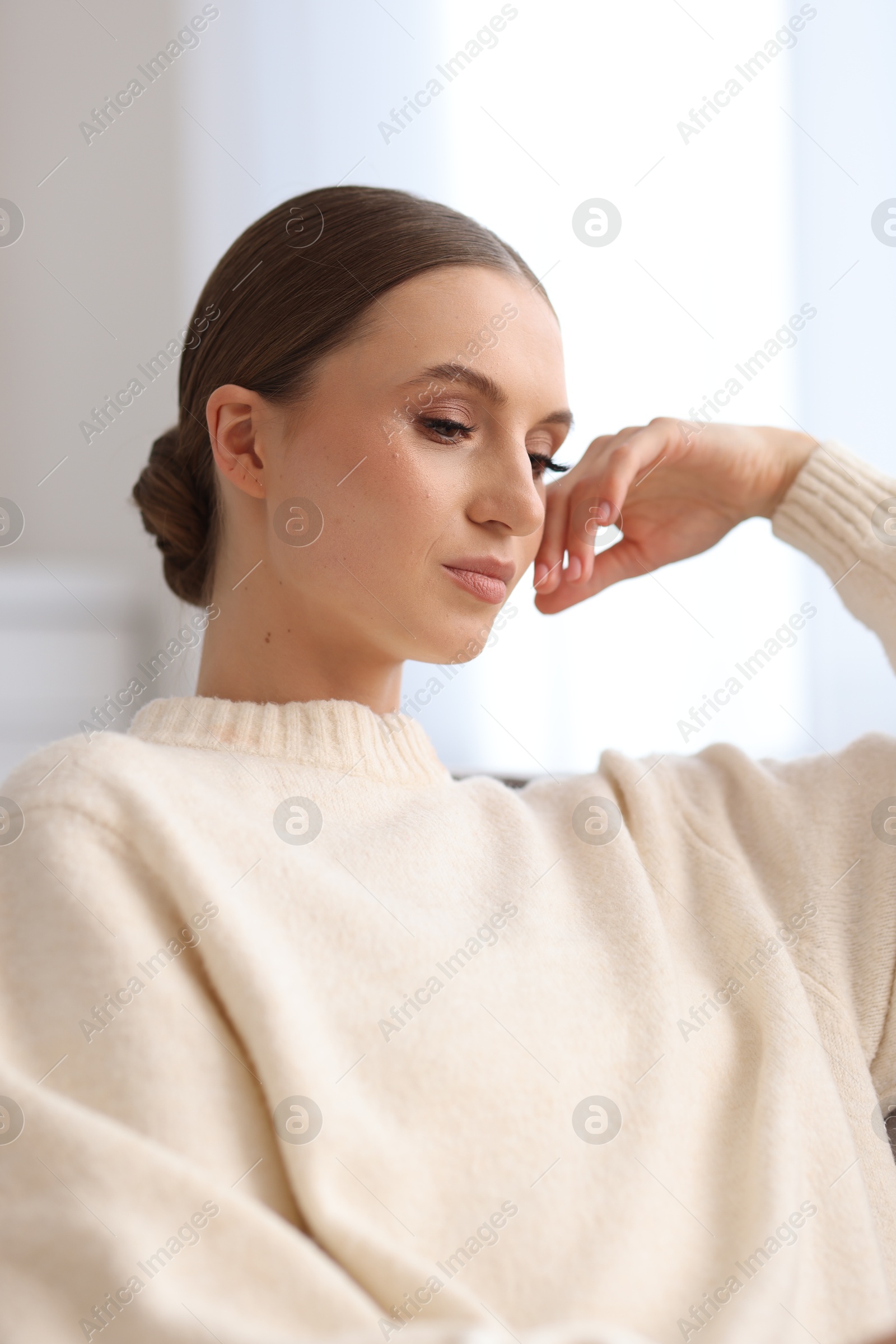 Portrait of beautiful young woman at home Photo of Portrait of beautiful young woman at home