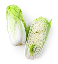 Photo of Whole and cut fresh Chinese cabbages isolated on white, top view