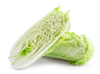 Photo of Whole and cut fresh Chinese cabbages isolated on white