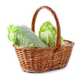 Photo of Fresh Chinese cabbages in wicker basket isolated on white