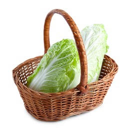 Photo of Fresh Chinese cabbages in wicker basket isolated on white