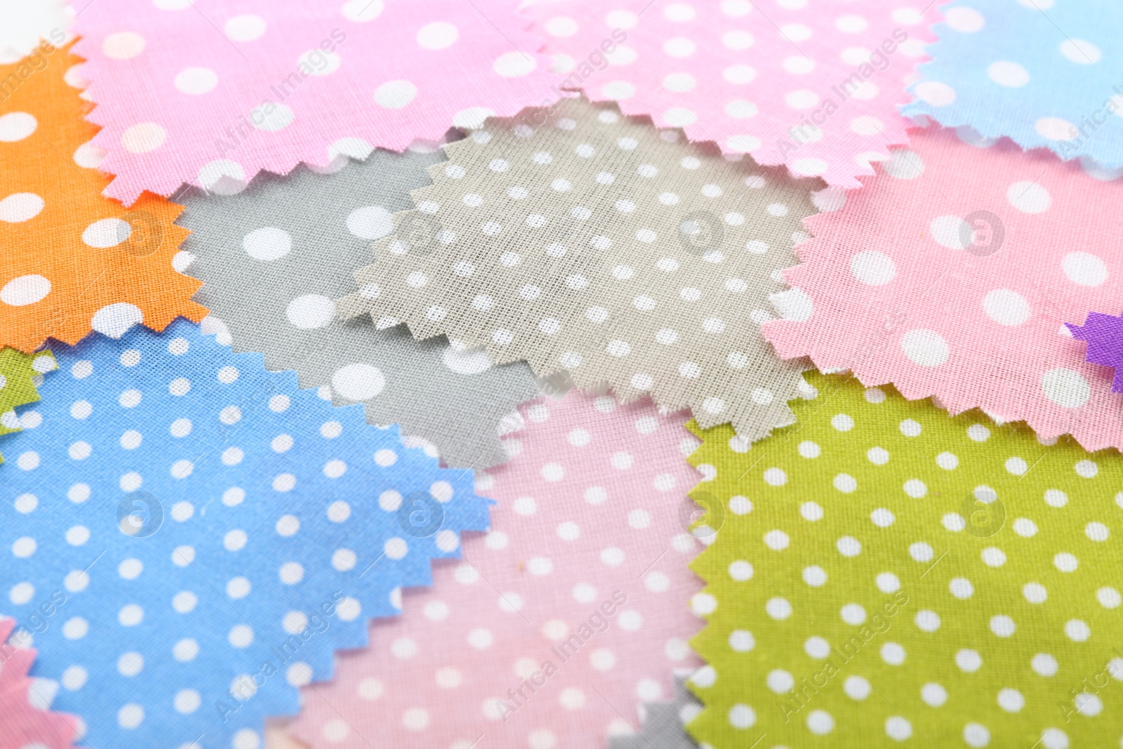 Samples of different fabrics as background, closeup Photo of Samples of different fabrics as background, closeup