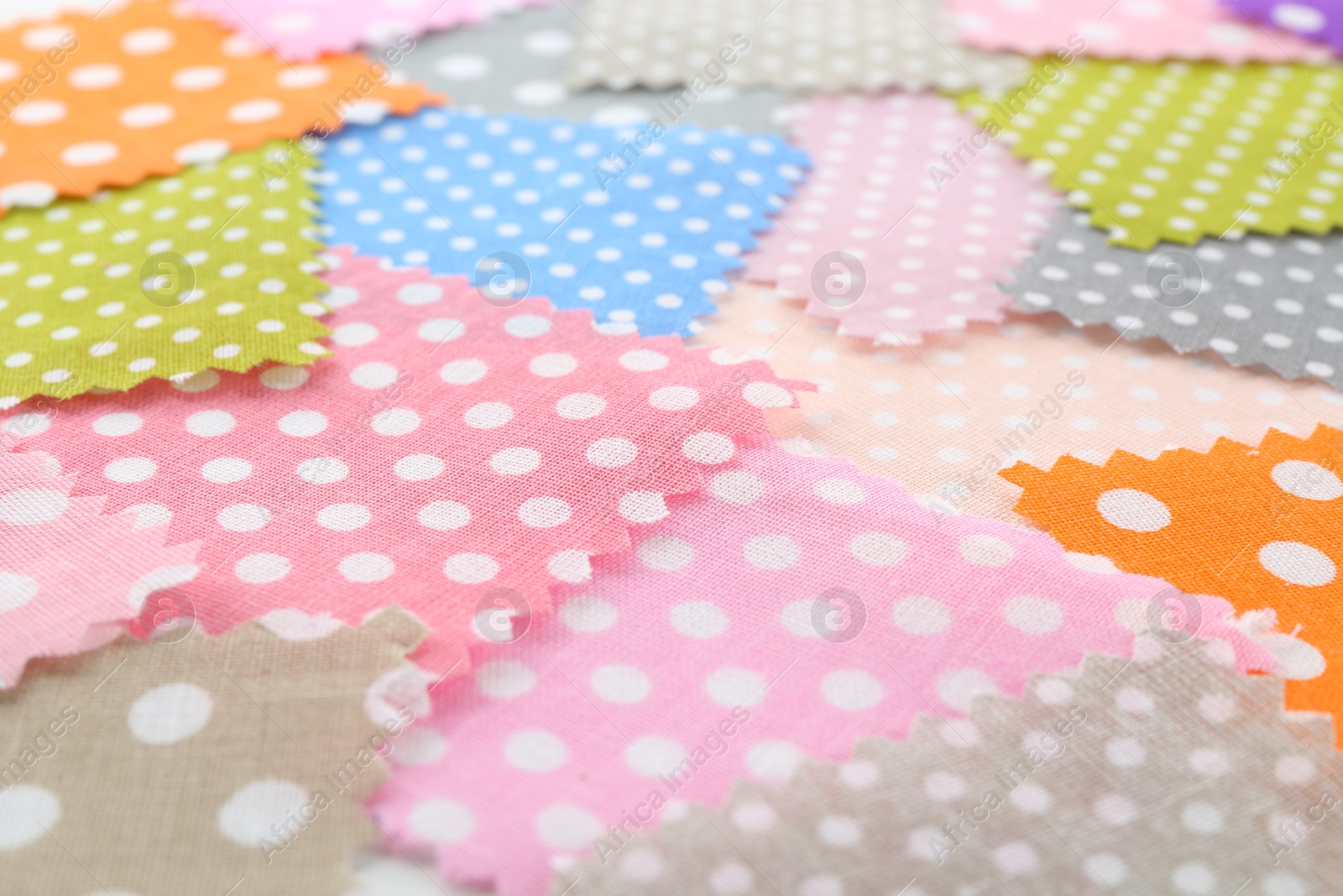 Samples of different fabrics as background, closeup Photo of Samples of different fabrics as background, closeup