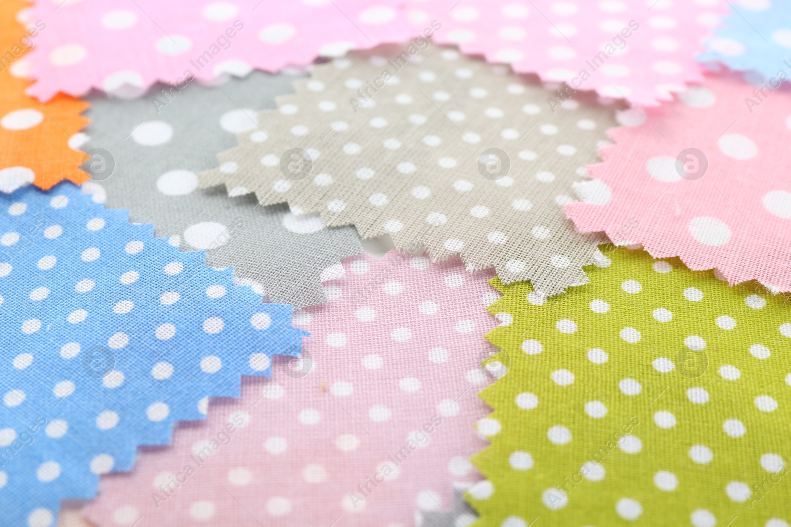 Samples of different fabrics as background, closeup Photo of Samples of different fabrics as background, closeup