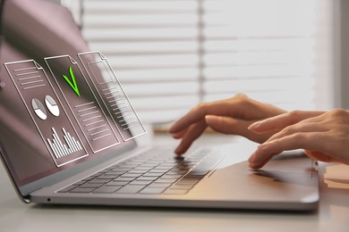 Image of Approved. Woman using laptop at table, closeup. Virtual screen with documents above computer