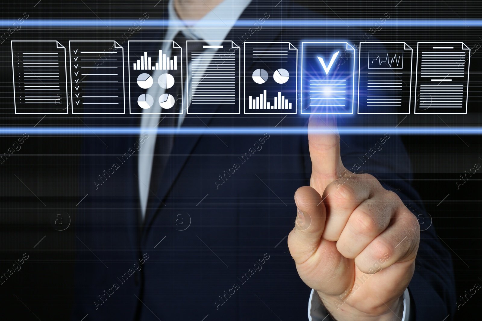 Businessman approving documents on virtual screen against black background, closeup Image of Businessman approving documents on virtual screen against black background, closeup