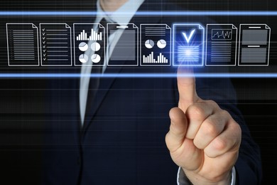 Image of Businessman approving documents on virtual screen against black background, closeup