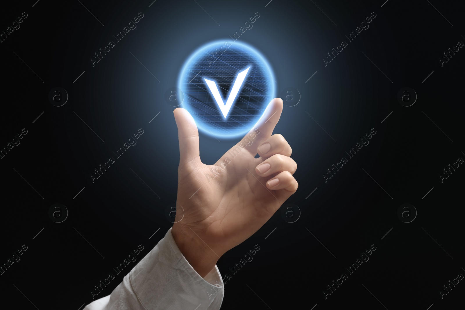 Approved. Woman holding virtual check mark against black background, closeup Image of Approved. Woman holding virtual check mark against black background, closeup
