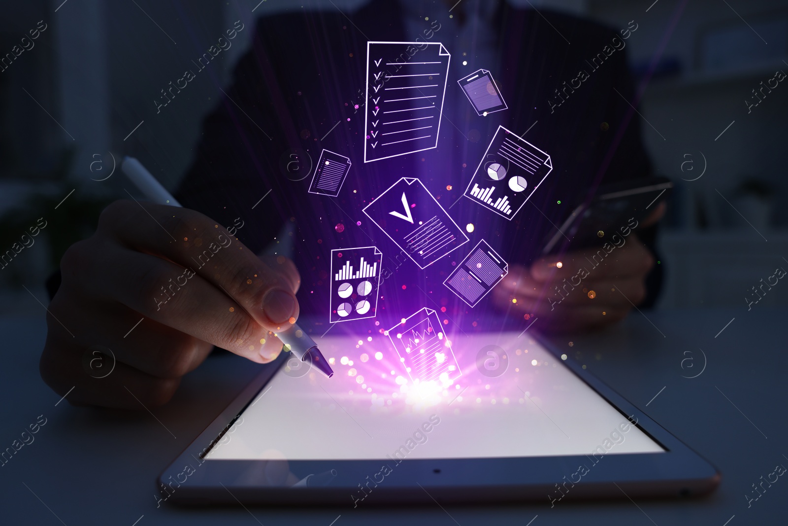 Approved. Virtual documents flying out of tablet computer. Man using device at table, closeup Image of Approved. Virtual documents flying out of tablet computer. Man using device at table, closeup