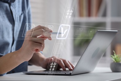 Image of Man approving documents on virtual screen above laptop at table, closeup