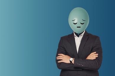 Image of Balloon with sad face instead of man's head on blue background. Space for text