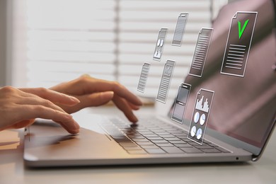 Image of Approved. Woman using laptop at table, closeup. Virtual screen with documents above computer
