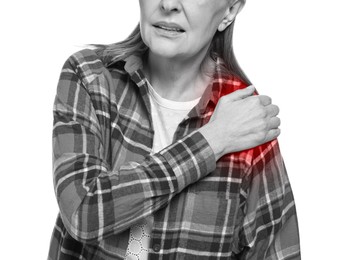 Image of Arthritis. Woman suffering from pain in shoulder on white background, closeup. Black and white toning with red color accent