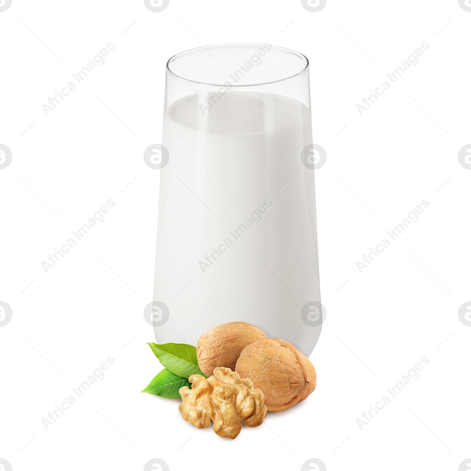Nut milk in glass and walnuts isolated on white Image of Nut milk in glass and walnuts isolated on white