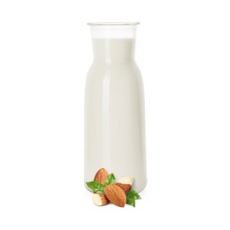 Image of Nut milk in glass bottle and almonds isolated on white